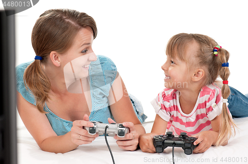 Image of Mom and daughter playing with Joystick