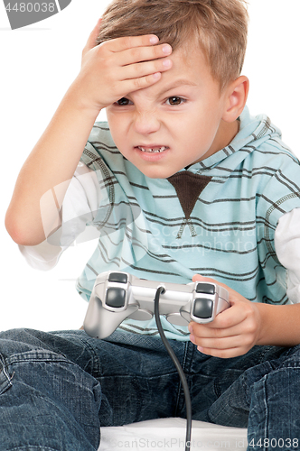 Image of Boy playing with Joystick