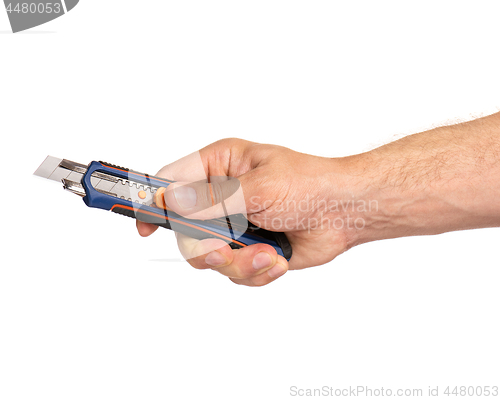 Image of Hand holding stationery knife