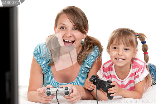 Image of Mom and daughter playing with Joystick