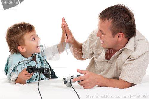 Image of Dad and son playing with Joystick