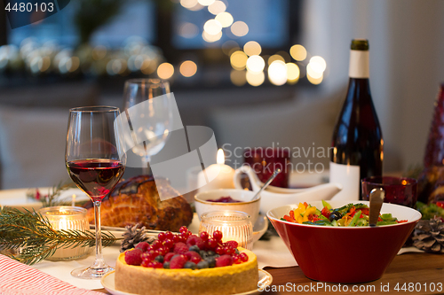 Image of food and drinks on christmas table at home