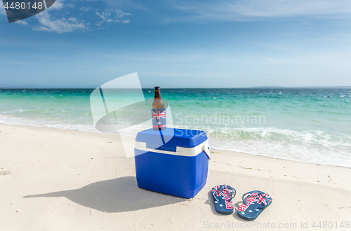 Image of Esky thongs and a cold drink on the beach in Australia