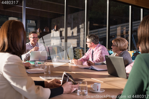 Image of Business Team At A Meeting at modern office building