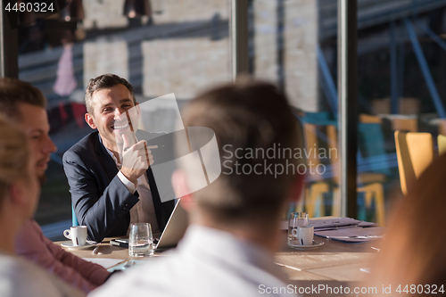 Image of Business Team At A Meeting at modern office building