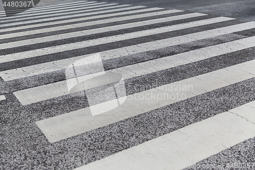 Image of close up of crosswalk road surface marking