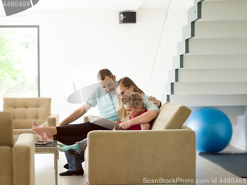 Image of family with little boy enjoys in the modern living room