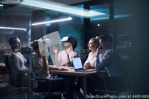 Image of Multiethnic Business team using virtual reality headset