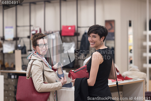 Image of best friend shopping in big mall