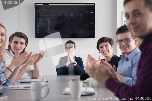 Image of Group of young people meeting in startup office