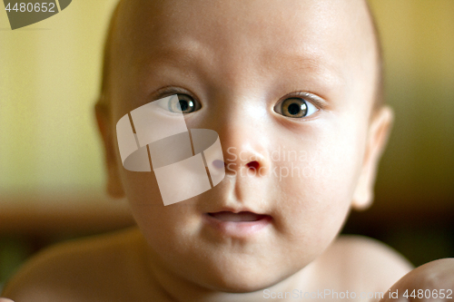 Image of Little child looking at the camera