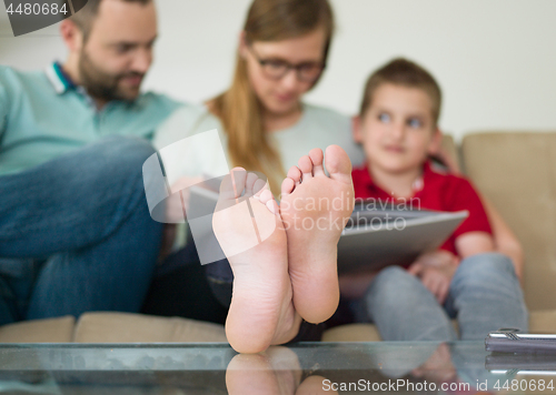 Image of family with little boy enjoys in the modern living room