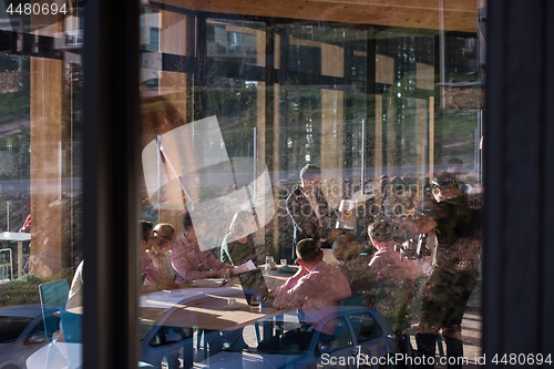 Image of Business Team At A Meeting at modern office building