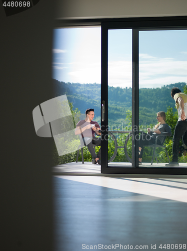 Image of couple enjoying morning coffee and breakfast