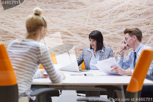 Image of Business Team At A Meeting at modern office building