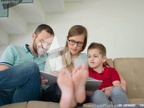 Image of family with little boy enjoys in the modern living room