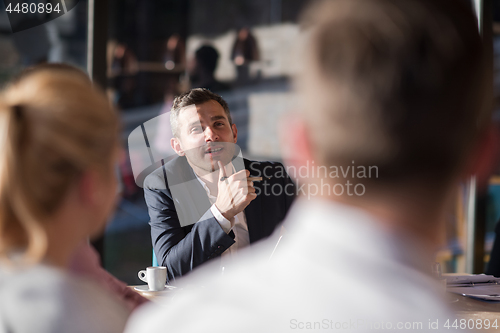 Image of Business Team At A Meeting at modern office building