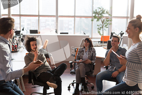 Image of Young Business Team At A Meeting at modern office building