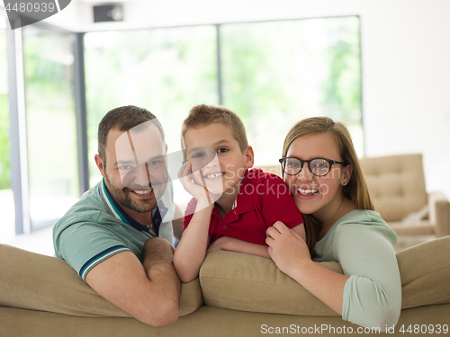 Image of family with little boy enjoys in the modern living room