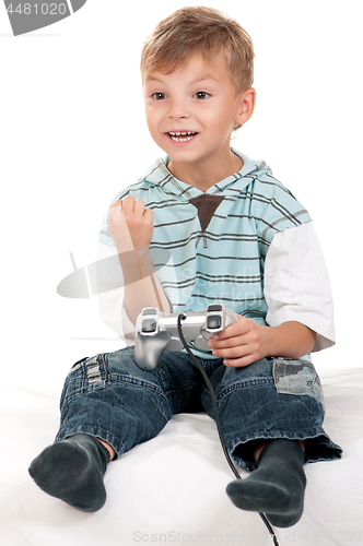 Image of Boy playing with Joystick