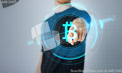 Image of close up of man with bitcoin hologram