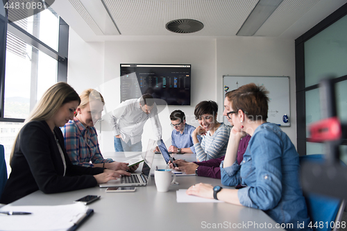 Image of Group of young people meeting in startup office