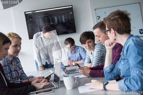 Image of Group of young people meeting in startup office