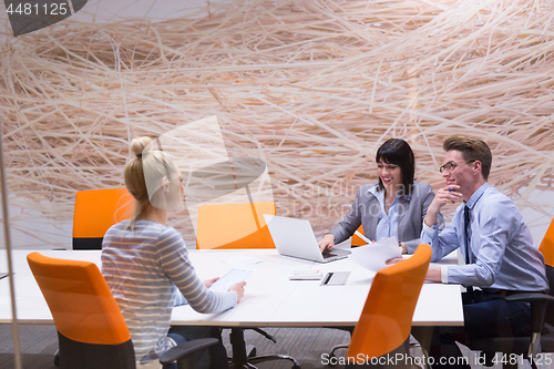 Image of Business Team At A Meeting at modern office building