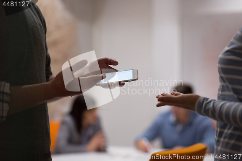 Image of Business Team At A Meeting at modern office building