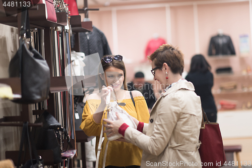 Image of best friend shopping in big mall