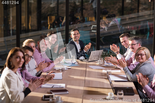 Image of Business Team At A Meeting at modern office building