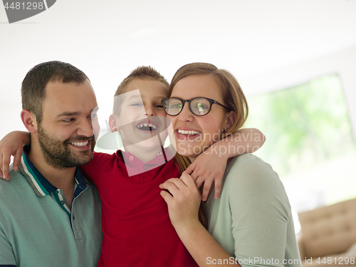 Image of family with little boy enjoys in the modern living room