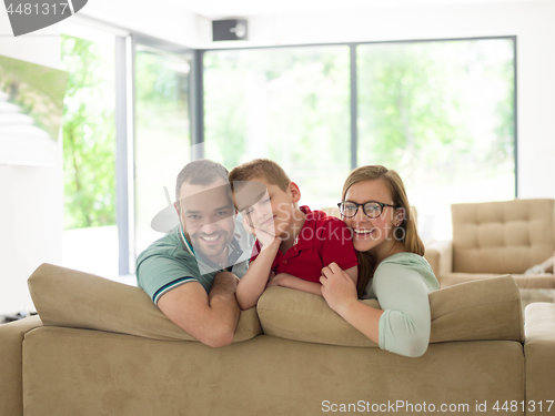 Image of family with little boy enjoys in the modern living room