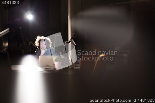 Image of businessman relaxing at the desk