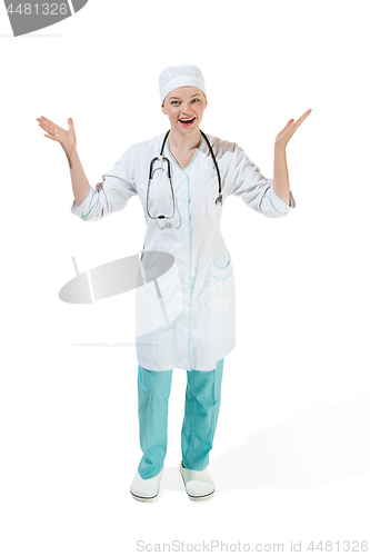 Image of Beautiful young woman in white coat posing and laughs at studio. Full length studio shot isolated on white.