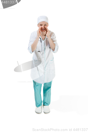 Image of Beautiful young woman in white coat posing at studio. Full length studio shot isolated on white.
