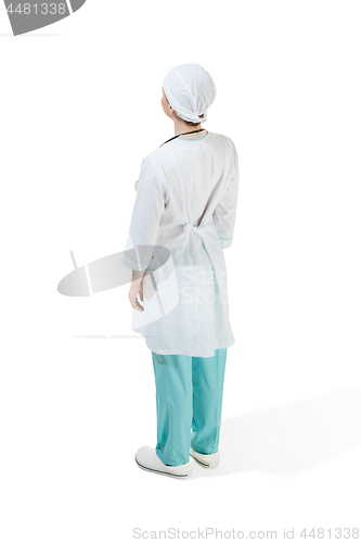 Image of Beautiful young woman in white coat posing at studio. Full length studio shot isolated on white.
