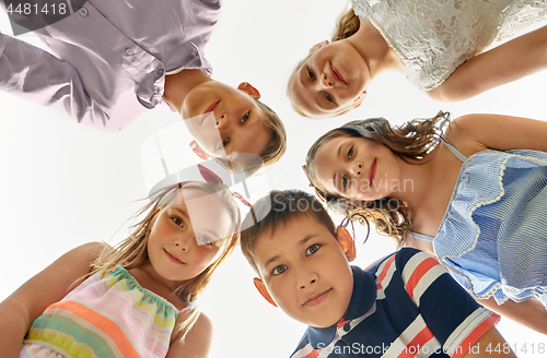 Image of group of happy children in circle