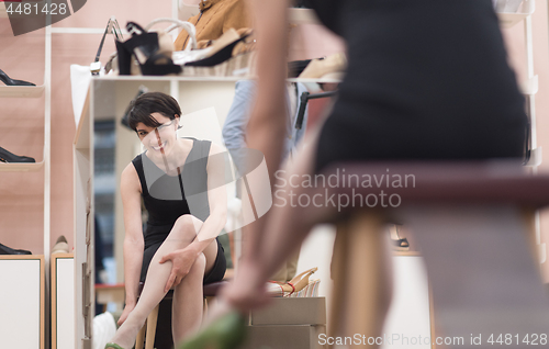 Image of Woman Trying New Shoes