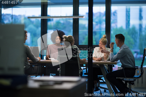 Image of Business Team At A Meeting at modern office building