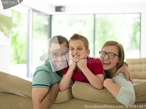 Image of family with little boy enjoys in the modern living room