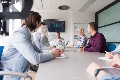 Image of Business Team At A Meeting at modern office building