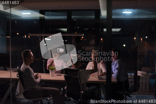 Image of Multiethnic Business team using virtual reality headset