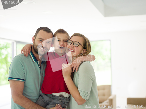 Image of family with little boy enjoys in the modern living room