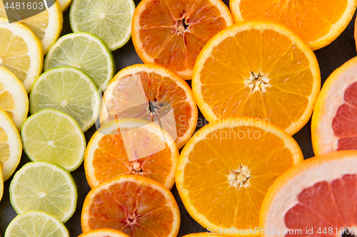 Image of close up of different citrus fruit slices