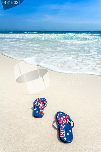 Image of Australian flag on thongs on the beach