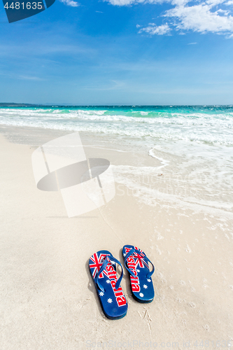 Image of Aussie thongs on beach in summer