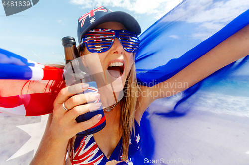 Image of Cheering proud patriotic Australian fan supporter