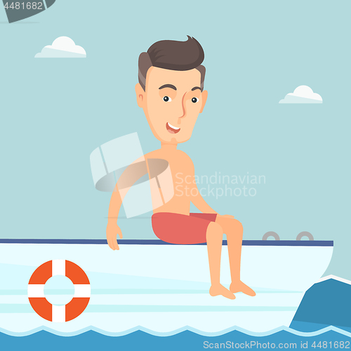 Image of Young happy man tanning on a sailboat.