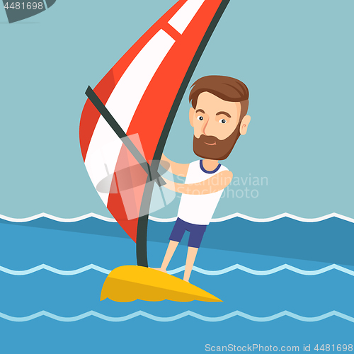 Image of Young man windsurfing in the sea.